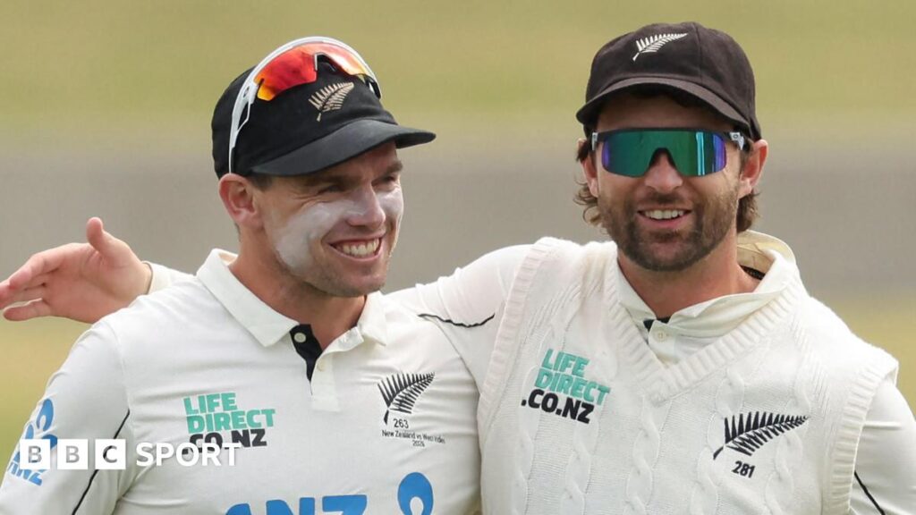New Zealand openers Tom Latham and Devon Conway celebrate after their team