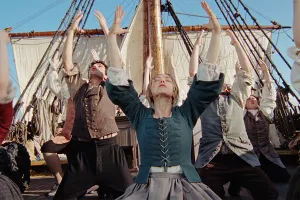 Amanda Seyfried and ensemble in THE TESTAMENT OF ANN LEE. Photo courtesy of Searchlight Pictures. © 2025 Searchlight Pictures All Rights Reserved.