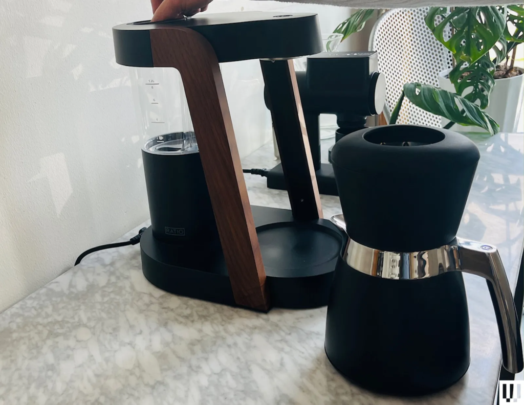 Image may contain Cookware Pot Cup Furniture Person Pottery and Table