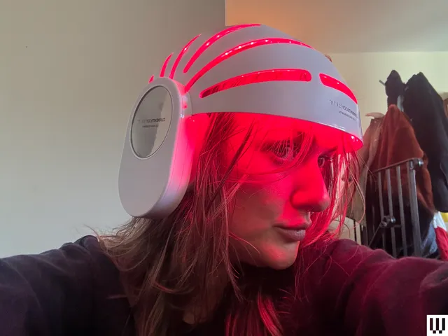 Image may contain: Adult, Person, Face, Head, Helmet, and Electronics