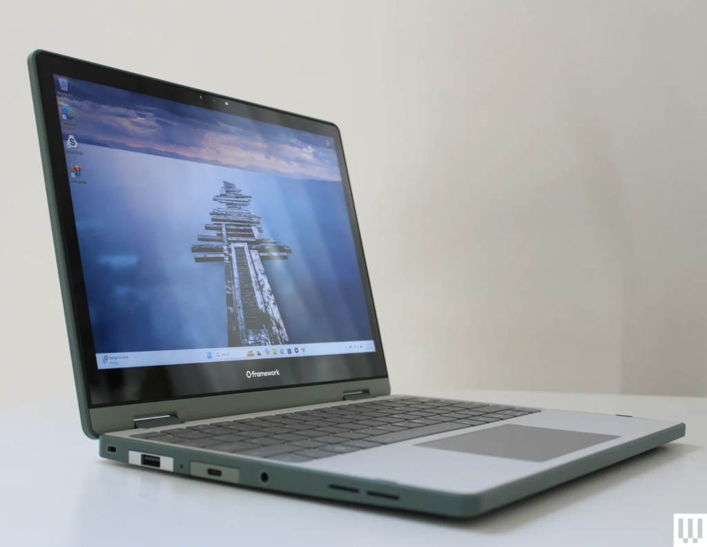 Image may contain Computer Electronics Laptop Pc Computer Hardware Hardware Monitor and Screen