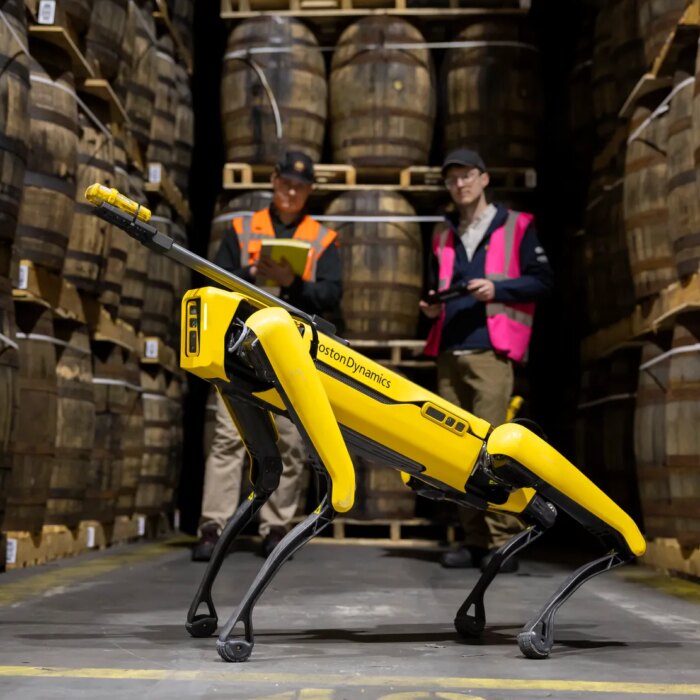 Image may contain Tyler Kolek Adult Person Clothing Vest Escooter Transportation Vehicle Architecture and Building