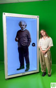 Image may contain Albert Einstein Adult Person Clothing Long Sleeve Sleeve Face Head Photography and Portrait