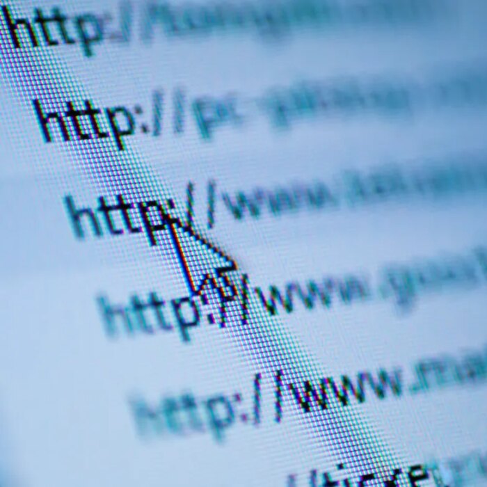 Cursor arrow pointing at URL on screen
