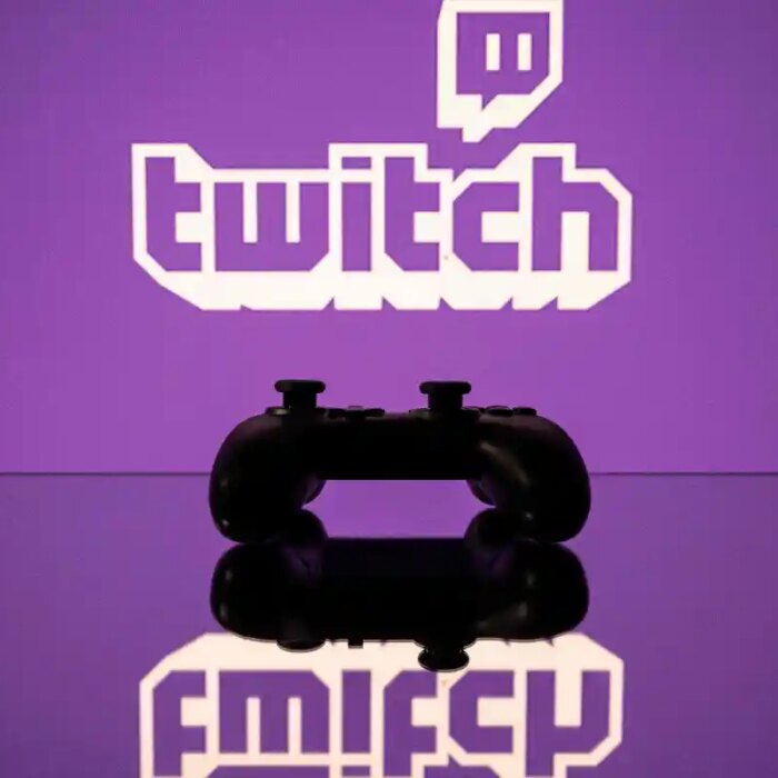 Twitch logo reflection with a controller