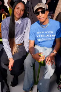 Helen Lasichanh Williams and Pharrell Williams at the Dior fashion show as part of Paris Fashion Week Fall 2026 on March 3, 2026 in Paris, France. (Photo by Swan Gallet/WWD via Getty Images)
