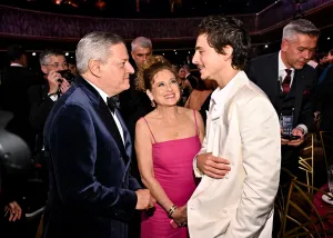 Ted Sarandos, Nicole Flender and Timothée Chalamet at the 32nd Annual Actor Awards Presented by SAG-AFTRA held at Shrine Auditorium and Expo Hall on March 01, 2026 in Los Angeles, California. (Photo by Michael Buckner/Variety via Getty Images)