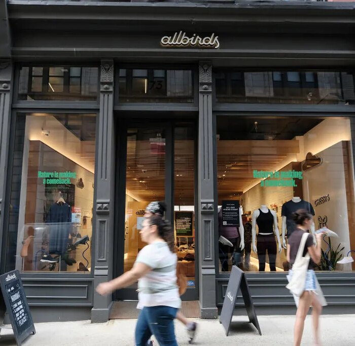 NEW YORK, NEW YORK - AUGUST 31: People walk past an Allbirds store, a maker of sustainable shoes, in lower Manhattan on August 31, 2021 in New York City. The shoe company has announced that it is preparing an initial public offering (IPO). The company has lost money and expects it will continue to be unprofitable for the foreseeable future. (Photo by Spencer Platt/Getty Images)