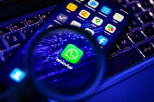 The WhatsApp icon displayed on an iPhone.