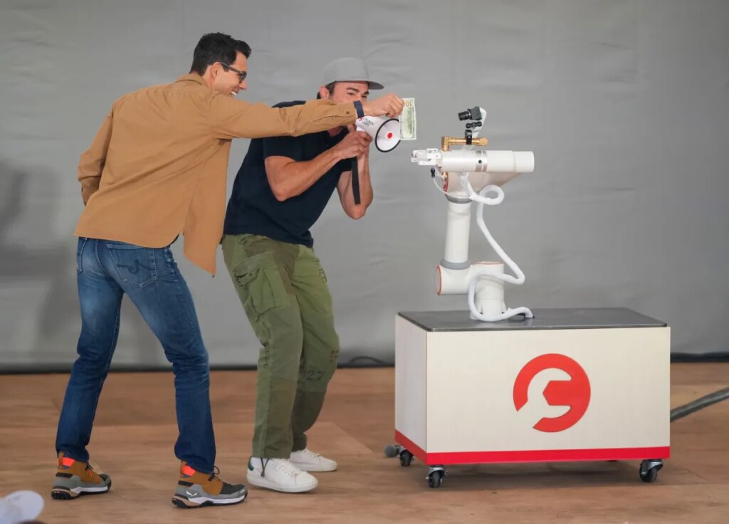 Rivian's RJ Scaringe thinks we're doing robots all wrong