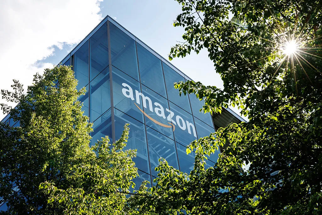 The logo and lettering of global online mail order company Amazon can be seen on the façade of Amazon Germany