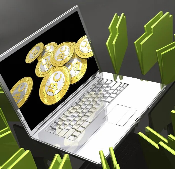 Laptop with bitcoins and files, illustration.
