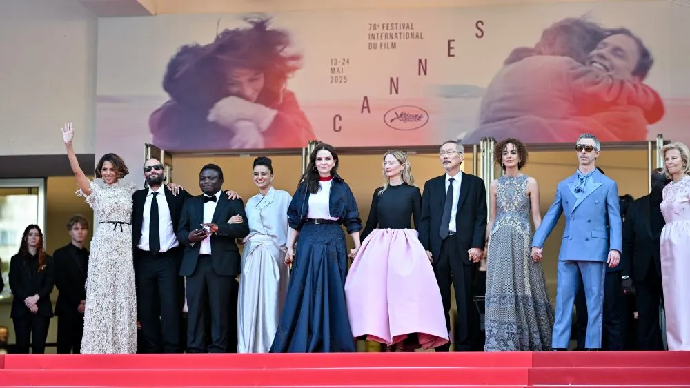 Halle Berry, Carlos Reygadas, Dieudo Hamadi, Payal Kapadia, Juliette Binoche, Alba Rohrwacher, Hong Sang-soo, Leïla Slimani, Jeremy Strong, Simone Friedman during the Closing Ceremony of the 78th Cannes Film Festival held at the Palais des Festivals on May 24, 2025 in Cannes, France. (Photo by Earl Gibson III/Deadline via Getty Images)