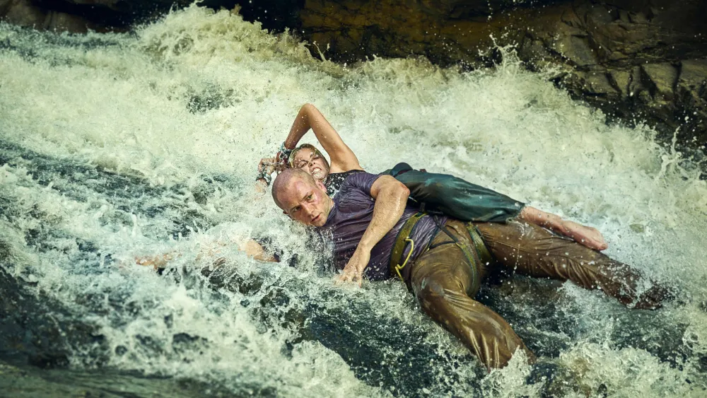 Charlize Theron and Taron Egerton Do Battle