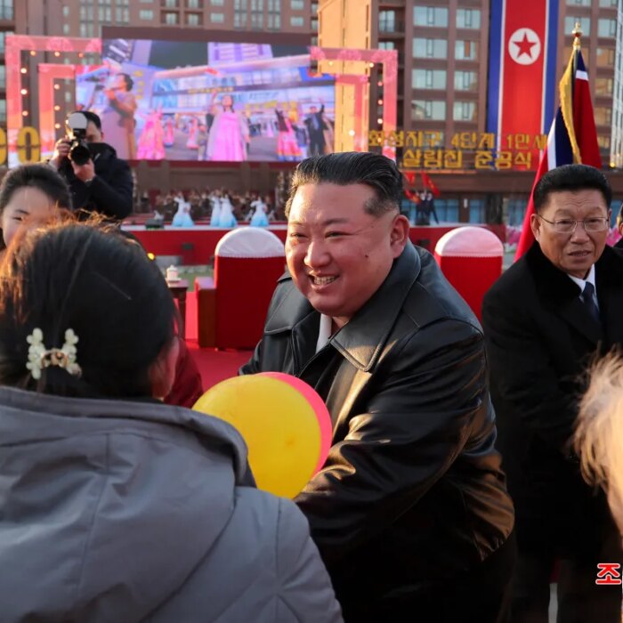 North Korean leader Kim Jong Un congratulating residents moving into their new homes at the inauguration ceremony of 10,000 flats at fourth stage in Hwasong area of Pyongyang.