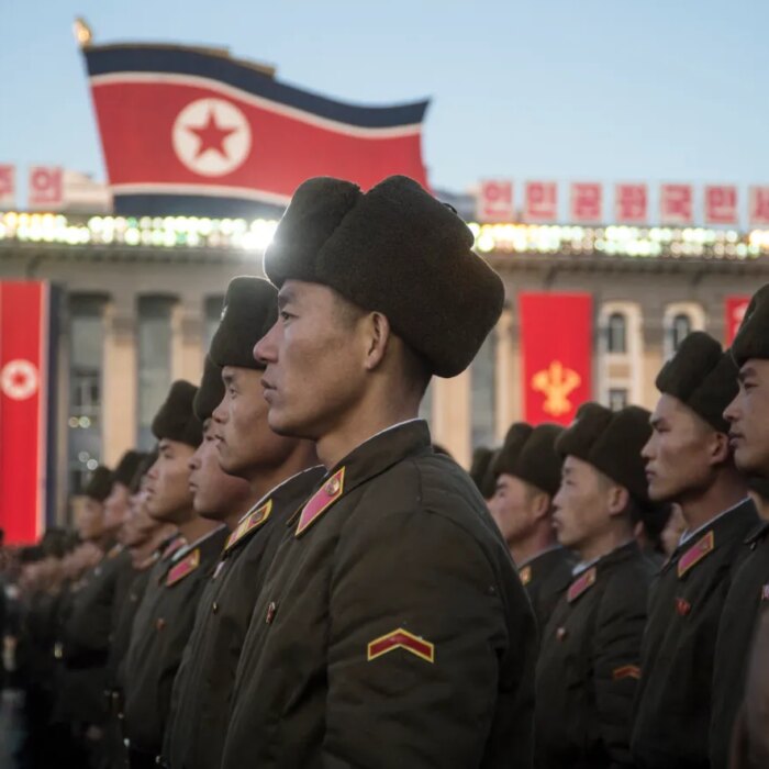 North Korean soldiers attend a mass rally to celebrate the North