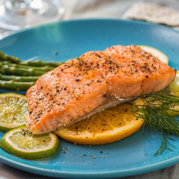 Grilled fillet of salmon with asparagus and a glass of white wine