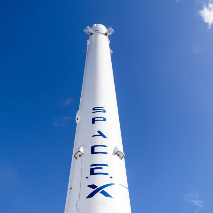A SpaceX Falcon 9 reusable rocket booster on display outside the company’s facilities in Hawthorne, California, US, on Monday, April 13, 2026.