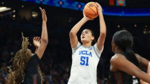 PHOENIX, ARIZONA - APRIL 05: Lauren Betts #51 of the UCLA Bruins shoots the ball against Maryam Dauda #30 of the South Carolina Gamecocks during the second quarter in the National Championship of the NCAA Women