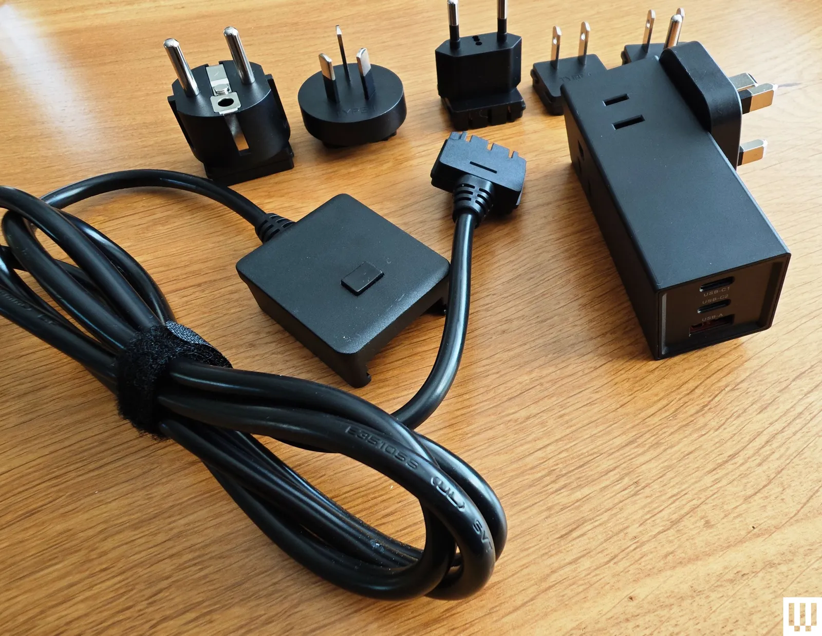 Image may contain Adapter Electronics and Plug