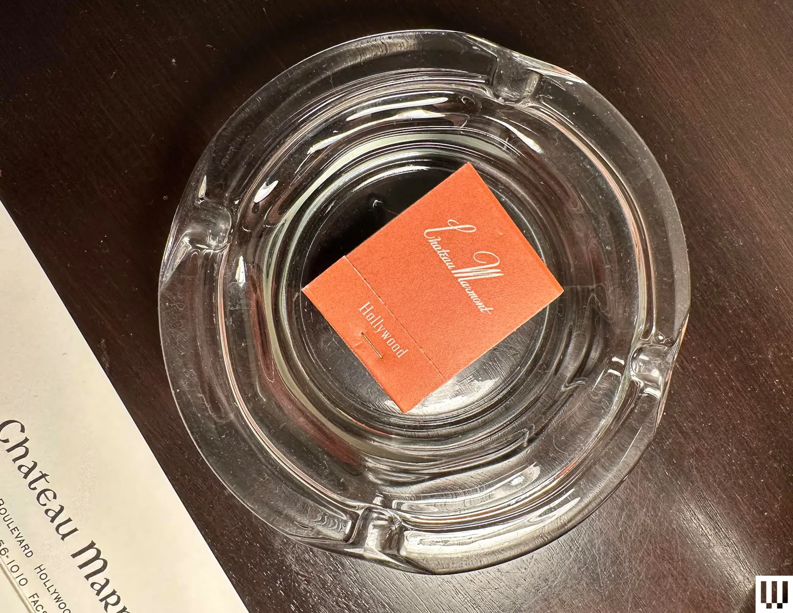 Image may contain Ashtray Business Card Paper and Text