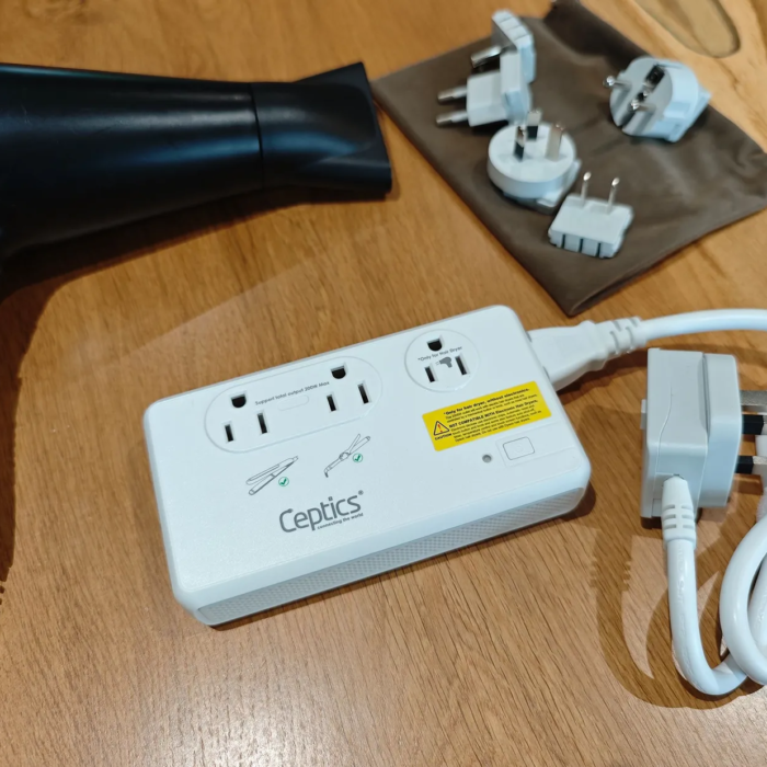 Image may contain Adapter Electronics Appliance Blow Dryer Device Electrical Device and Washer