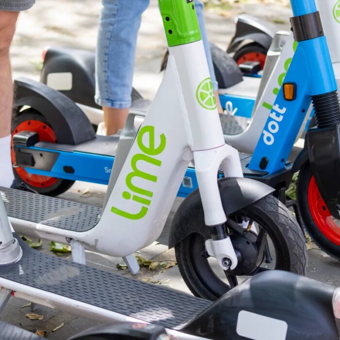 A row of e-scooters
