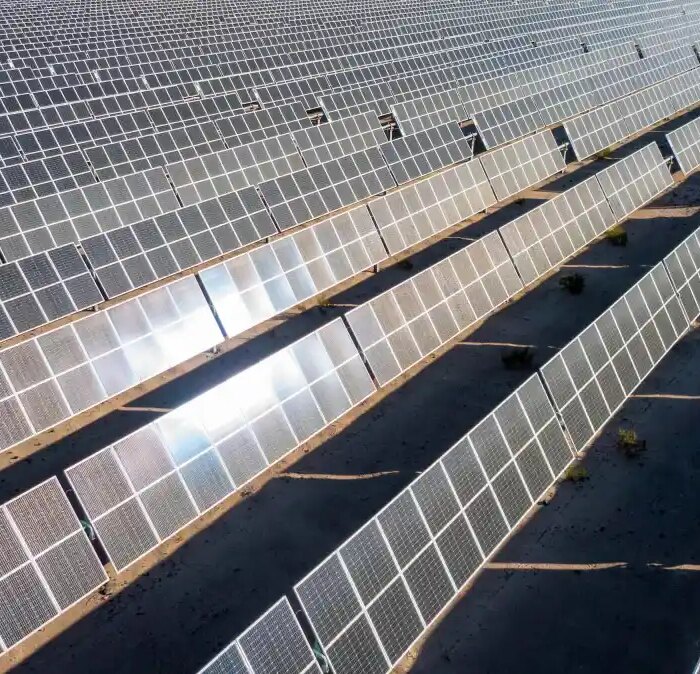 Rows of solar panels face the sunlight in Nevada.