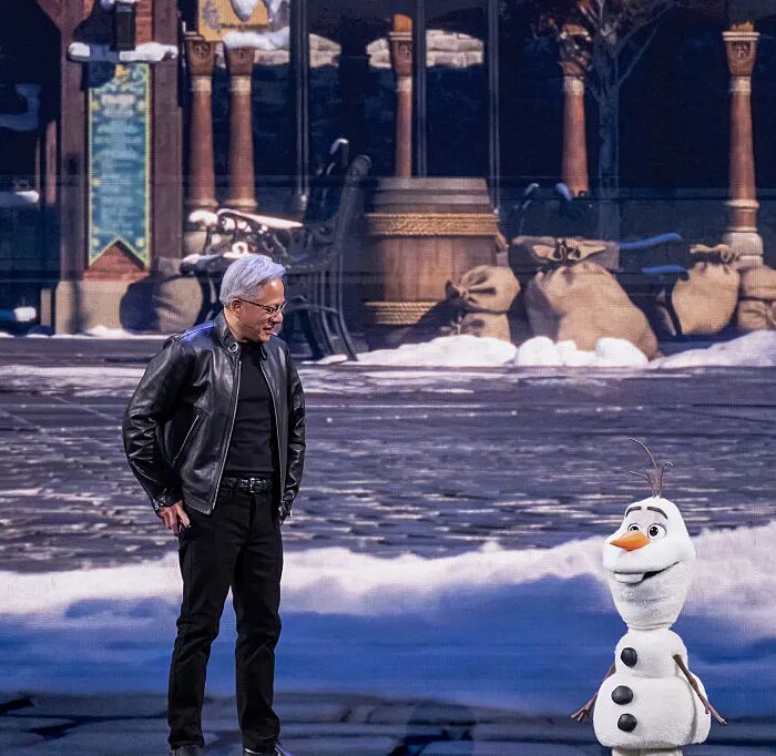 Jensen Huang, chief executive officer of Nvidia Corp., and Olaf, a robotic character from the Disney movie Frozen, during a keynote address at the Nvidia GTC conference in San Jose, California, US, on Monday, March 16, 2026. Nvidia Corp., the company at the center of an explosive build-out of AI computing, expects to generate at least $1 trillion from its Blackwell and Rubin chips through the end of 2027.