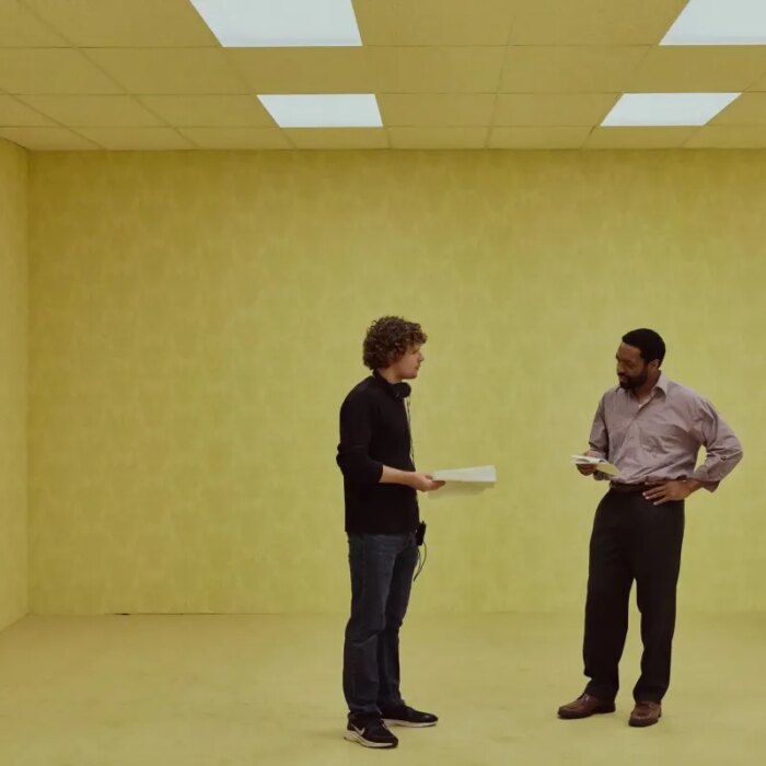 A photo of Kane Parsons and Chiwetel Ejiofor on the set of