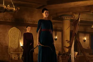 L to R: Mia Goth is Melantho and Anne Hathaway is Penelope in THE ODYSSEY, written, produced, and directed by Christopher Nolan.