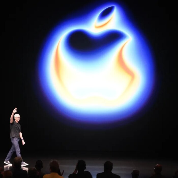 Apple CEO Tim Cook attends a product launch event.