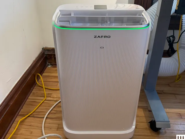 White rectangular portable air conditioner on hardwood floor