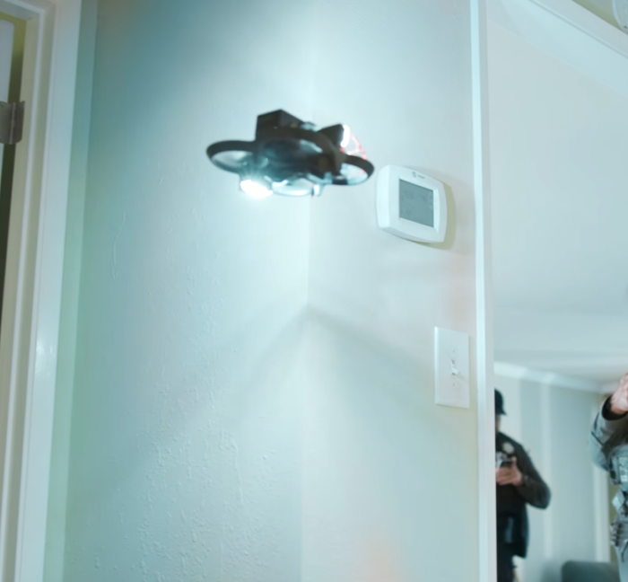 Odd police video shows drone removing knife from motionless suspect