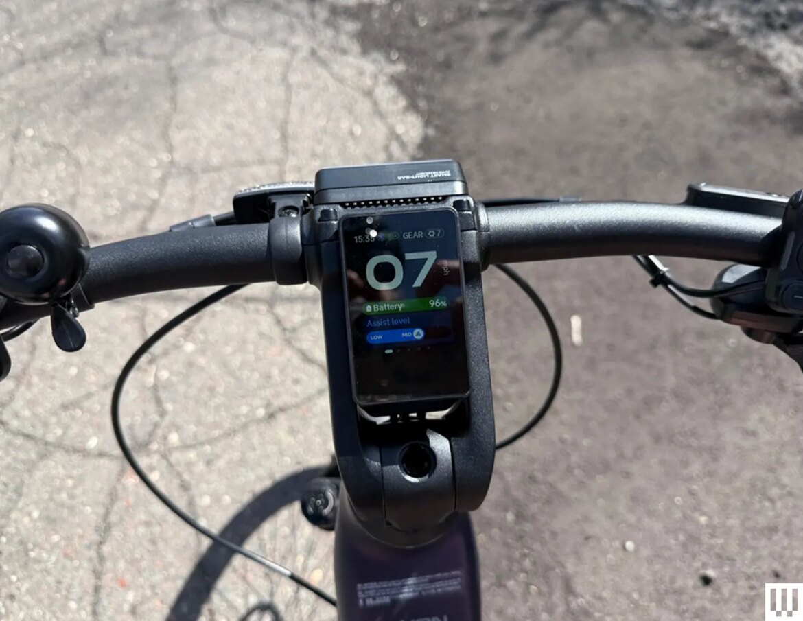 Image may contain Electronics Mobile Phone Phone Bicycle Transportation and Vehicle