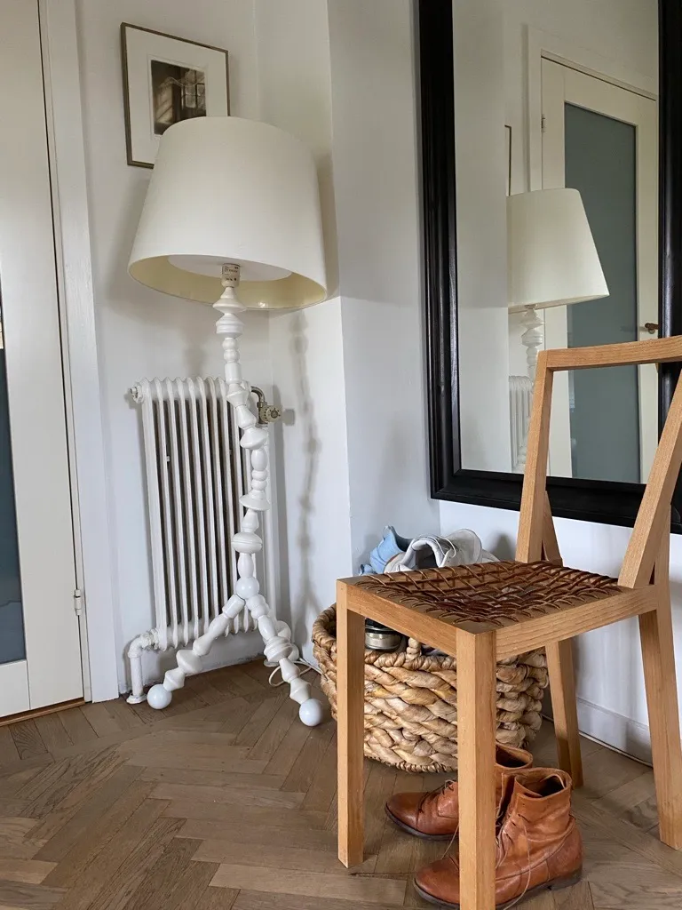 Image may contain Lamp Chair Furniture Art Painting and Floor Lamp